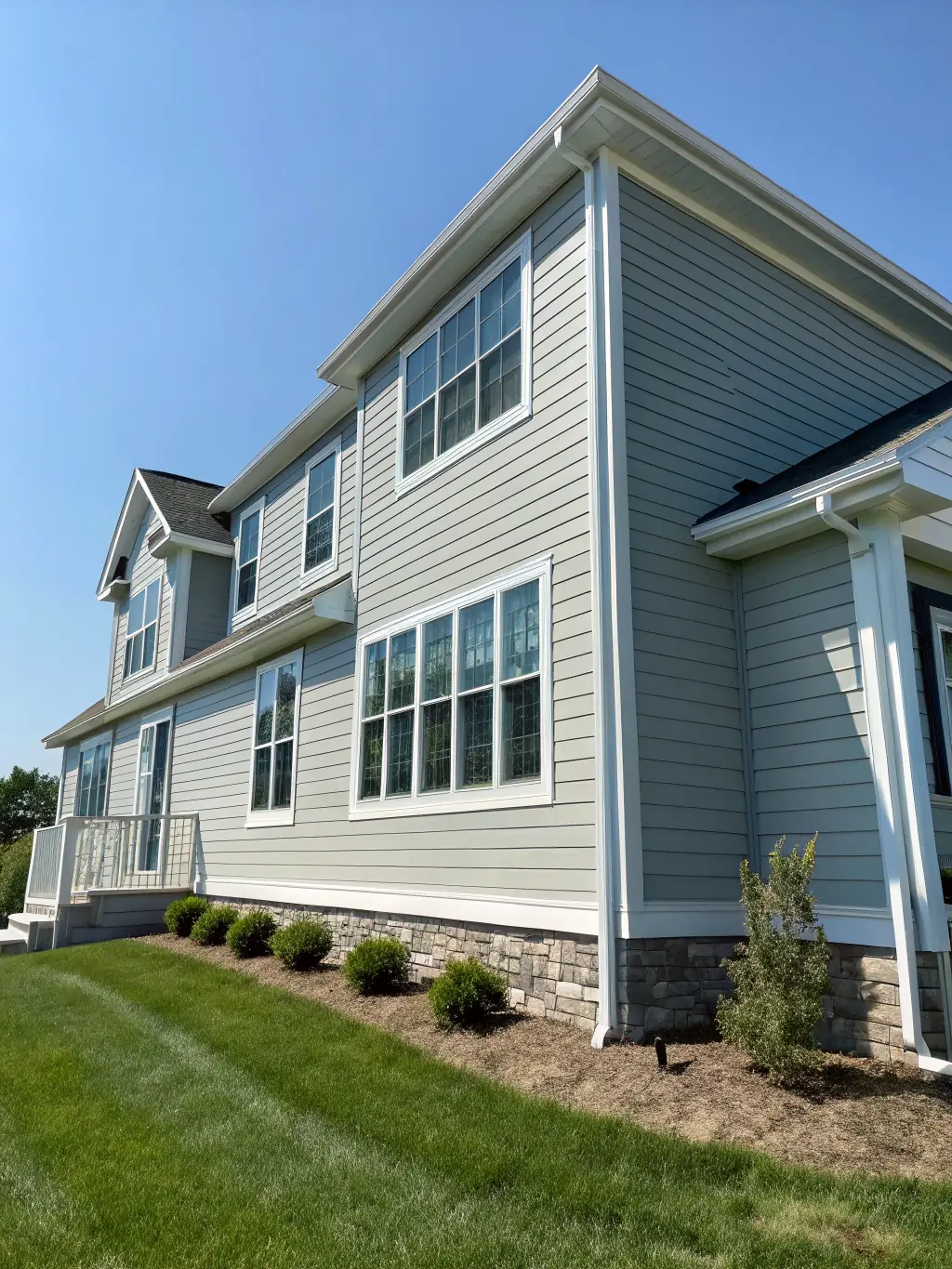 A high-quality photograph showcasing a recently completed siding installation project in Philadelphia, highlighting the clean lines and enhanced curb appeal.