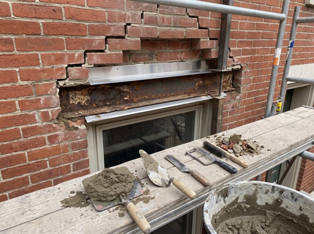 Rusting Brick Lintels: Warning Signs Above Openings